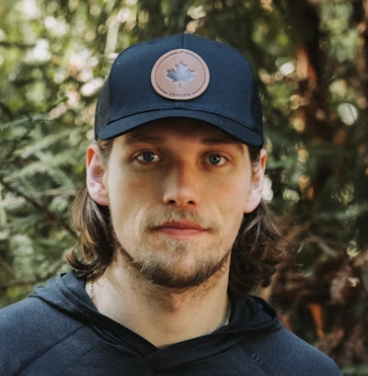 Man wearing navy baseball cap